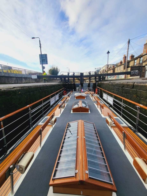 barge_under_bridge-canal_boat_restaurant