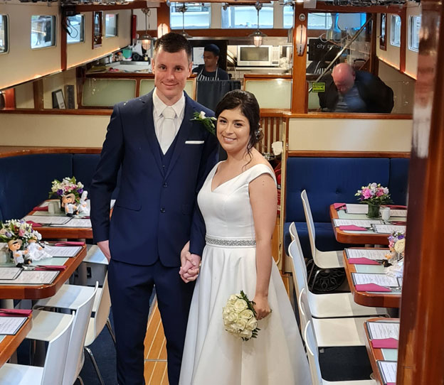 husband and bride - wedding at canal boat restaurant